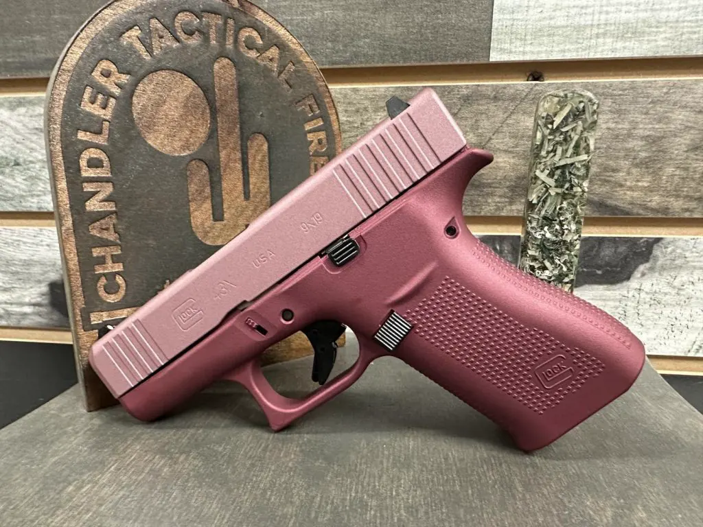 A complete rifle with a coordinated multi-part Cerakote finish.