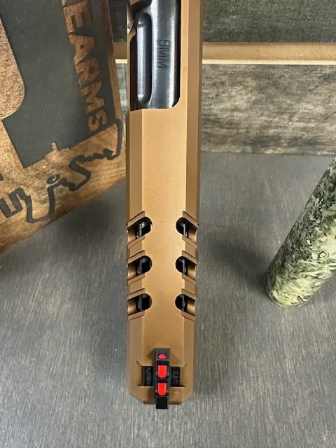 A Kimber 2K11 slide and barrel prepared for porting service.