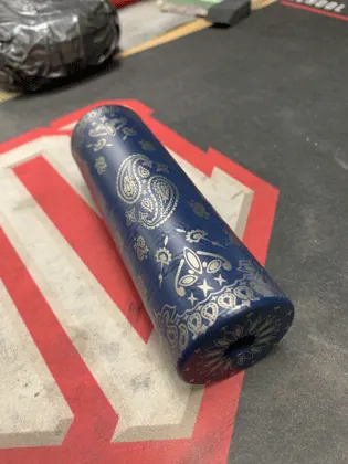 Deep laser markings on a cylindrical suppressor body.