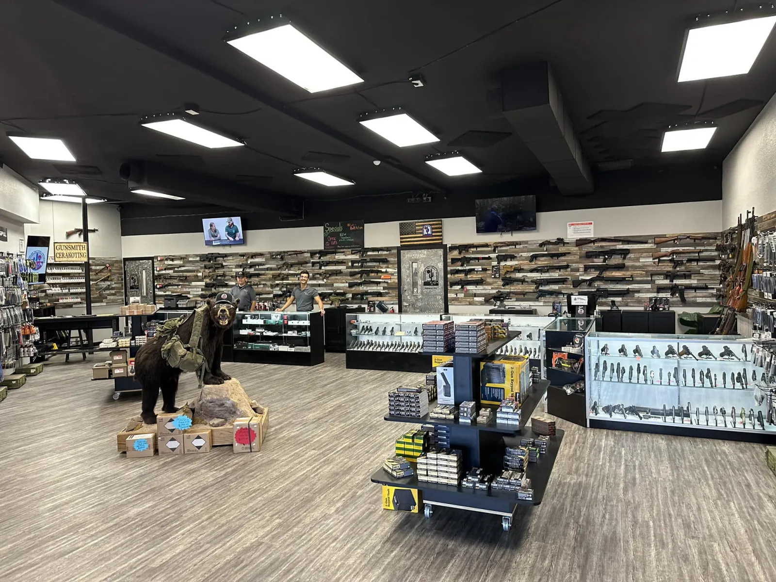 The Chandler Tactical retail counter and firearm display wall.